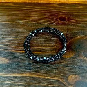 Handcrafted bracelet. Small black and white beaded bracelet